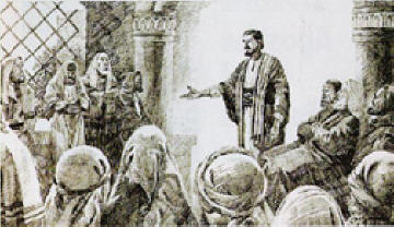 Paul talking to a group